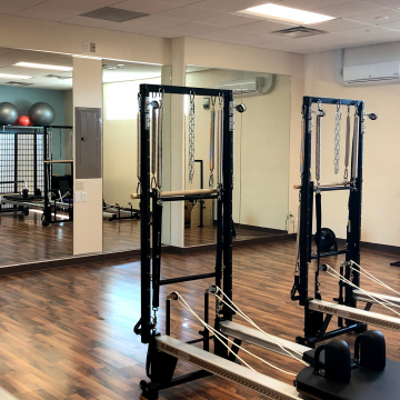Pilates reformers and studio mirrors